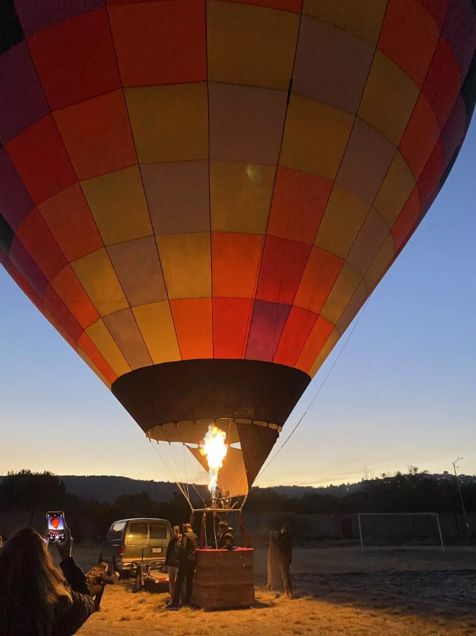 A hot air balloon getting ready for takeoff
